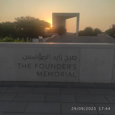 The memorial’s monument and entrance at sunset.