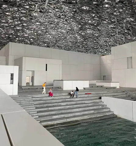 Louvre Abu Dhabi — Water surrounds the museum’s buildings.