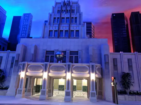 Illuminated Metropolis-style building inside Warner Bros. World Abu Dhabi