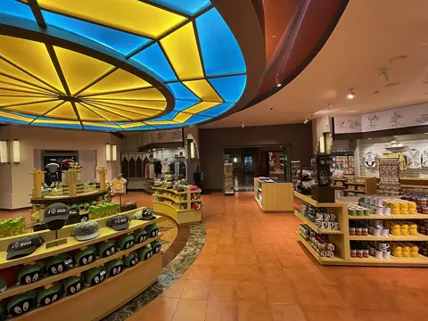 The themed gift-shop interior at Warner Bros. World Abu Dhabi; shops and displays may change.