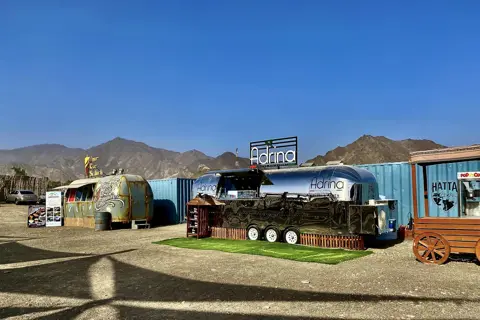 Food trucks and outdoor seating at Hatta Wadi Hub