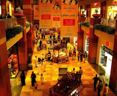 The mall’s warm-lit interior shopping galleries