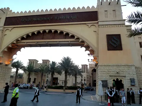 An ornate arched gateway at the souk entrance
