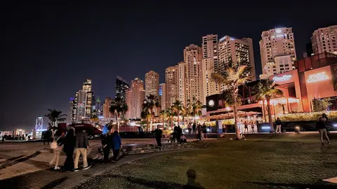 The illuminated JBR beachfront after dark