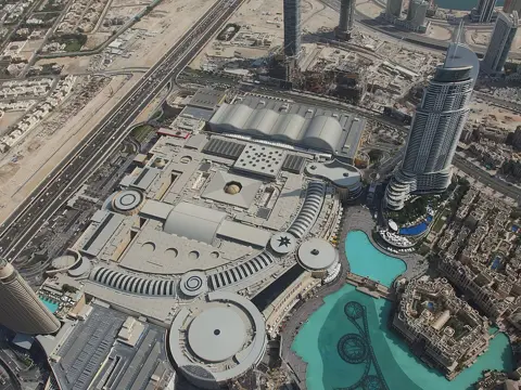 Dubai Mall’s roof and the neighbouring lake from above; archive photograph from At the Top SKY in 2014