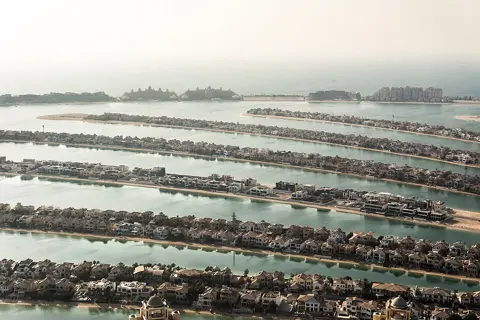 Rows of Palm Jumeirah’s fronds extend across the water, seen from The View’s observation level