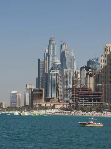 The JBR waterfront towers viewed from the beach and water