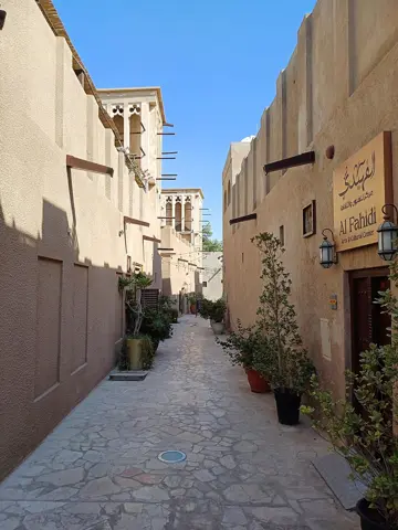 A narrow lane between restored heritage buildings