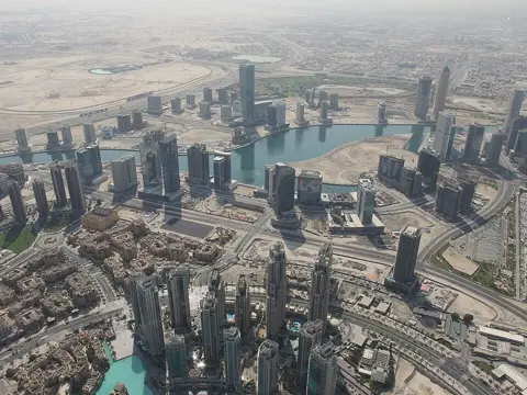 The Business Bay waterway and city blocks seen from At the Top SKY; archive photograph from 2014
