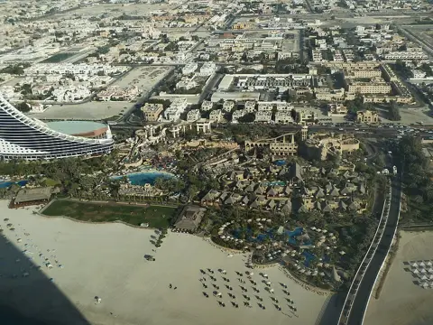 A wider aerial view of the waterpark and surrounding coast