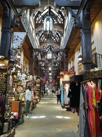 A covered shopping arcade inside Souk Madinat Jumeirah